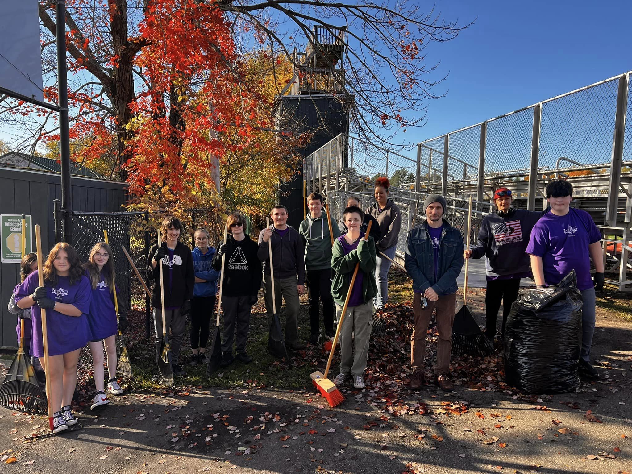 group of students from Waterville senior high participate in a day of caring